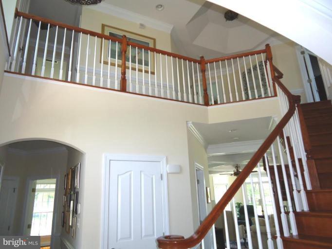 230 Bentons Pleasure Road Chester, MD 21619 - Photo 14 of 30 a view of staircase with railing and stairs