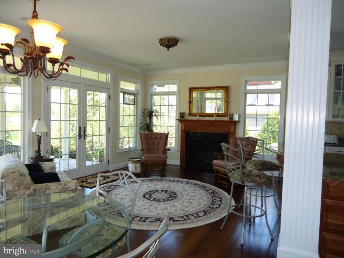 230 Bentons Pleasure Road Chester, MD 21619 - Photo 18 of 30 a living room with furniture and a fireplace