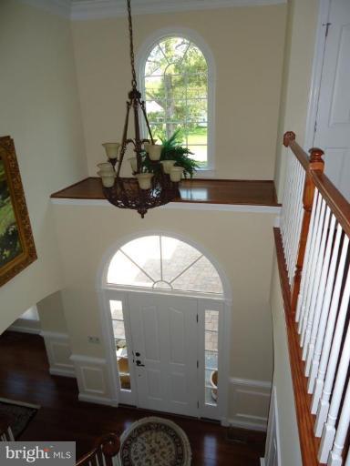 230 Bentons Pleasure Road Chester, MD 21619 - Photo 21 of 30 a room with furniture and a chandelier