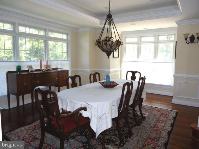 230 Bentons Pleasure Road Chester, MD 21619 - Photo 25 of 30 a view of a dining room with furniture window and wooden floor