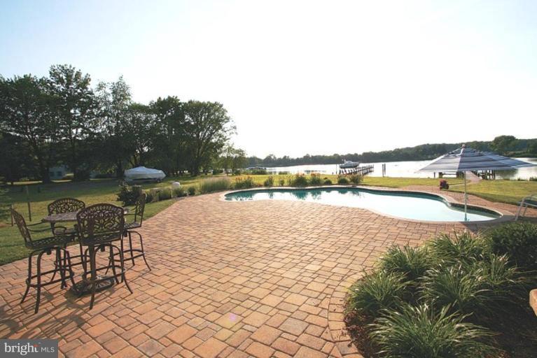 230 Bentons Pleasure Road Chester, MD 21619 - Photo 8 of 30 a view of a lake with outdoor space