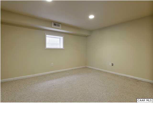 1144 Meriwether Street Charlottesville, VA 22902 - Photo 13 of 18 a black and white photo of a big room