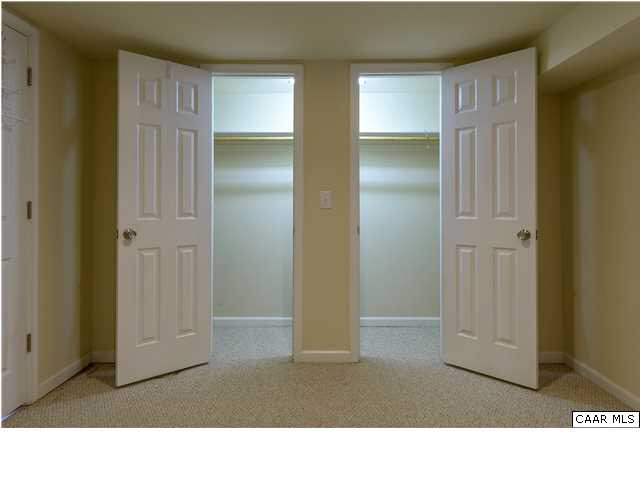 1144 Meriwether Street Charlottesville, VA 22902 - Photo 15 of 18 a room with closet and wooden floor
