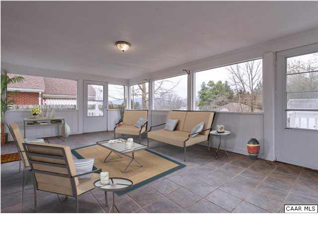 1144 Meriwether Street Charlottesville, VA 22902 - Photo 16 of 18 a living room with furniture and a large window