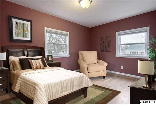 1144 Meriwether Street Charlottesville, VA 22902 - Photo 6 of 18 a bedroom with a bed and window
