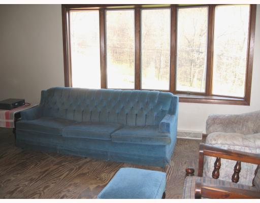 143 Swain Hill Road Harmony, PA 16037 - Photo 4 of 8 Living Room. Living Room w/view of woods from bow window