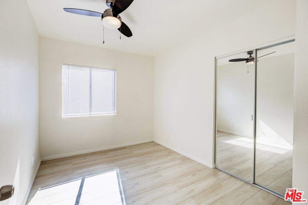 3659 6th Avenue, Unit 3661 1/2 Los Angeles, CA 90018 - Photo 12 of 23 a view of an empty room and window