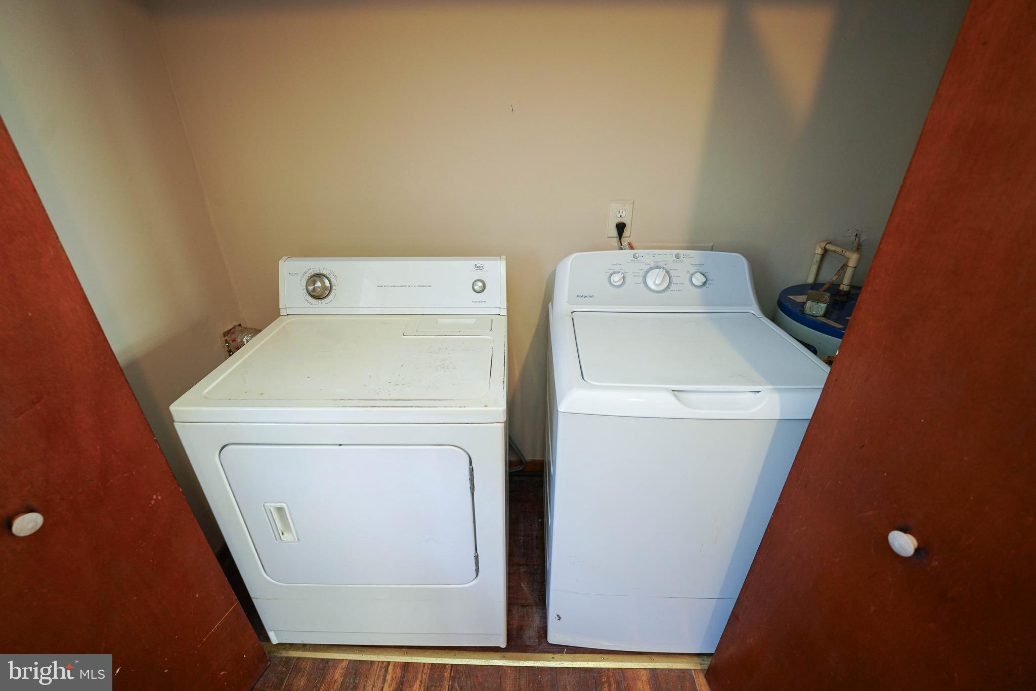 5746 Rip Wil Drive Salisbury, MD 21804 - Photo 15 of 35 a utility room with dryer and washer
