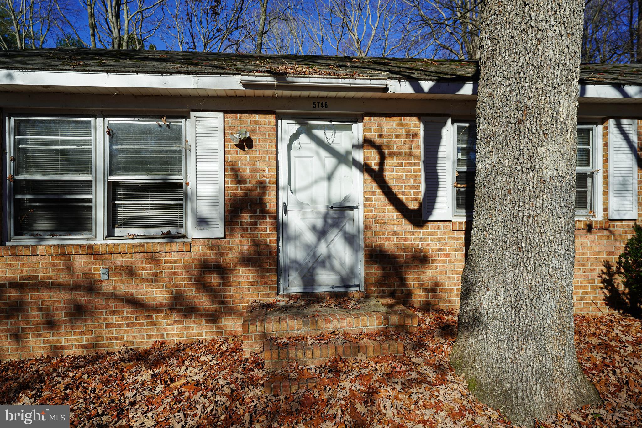 5746 Rip Wil Drive Salisbury, MD 21804 - Photo 7 of 35 a front view of a house with garden