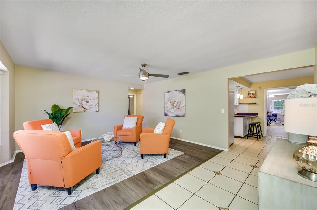 11290 142nd Street North Largo, FL 33774 - Photo 15 of 90 a living room with furniture and a table