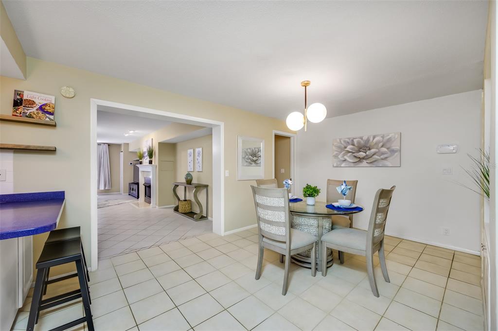 11290 142nd Street North Largo, FL 33774 - Photo 16 of 90 a view of a dining room with furniture