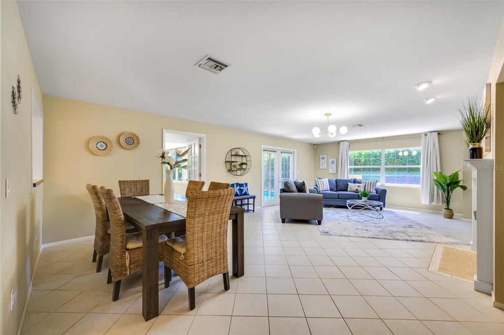 11290 142nd Street North Largo, FL 33774 - Photo 24 of 90 a living room with furniture and a table