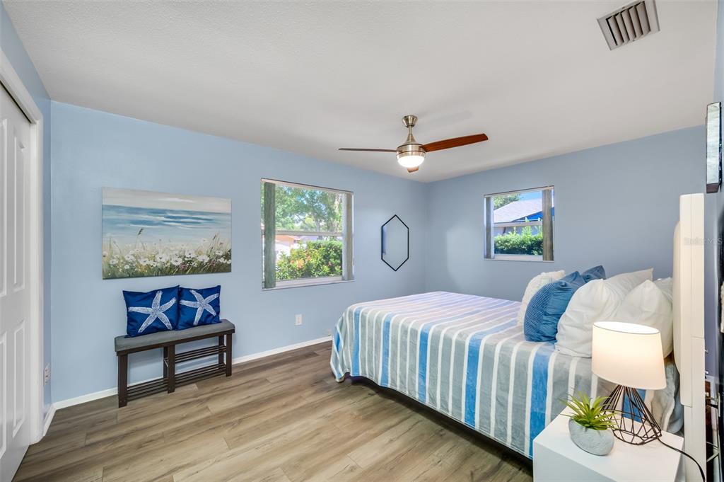 11290 142nd Street North Largo, FL 33774 - Photo 42 of 90 a bedroom with a bed and a window