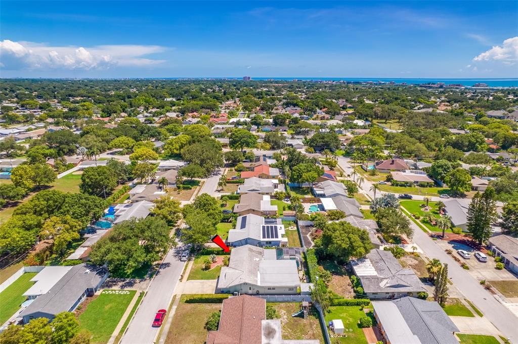 11290 142nd Street North Largo, FL 33774 - Photo 72 of 90 an aerial view of residential houses with outdoor space and trees