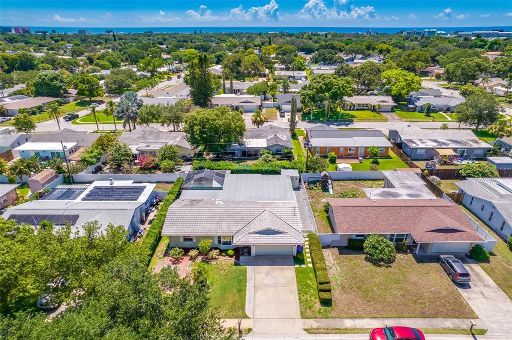 11290 142nd Street North Largo, FL 33774 - Photo 82 of 90 an aerial view of residential houses with outdoor space