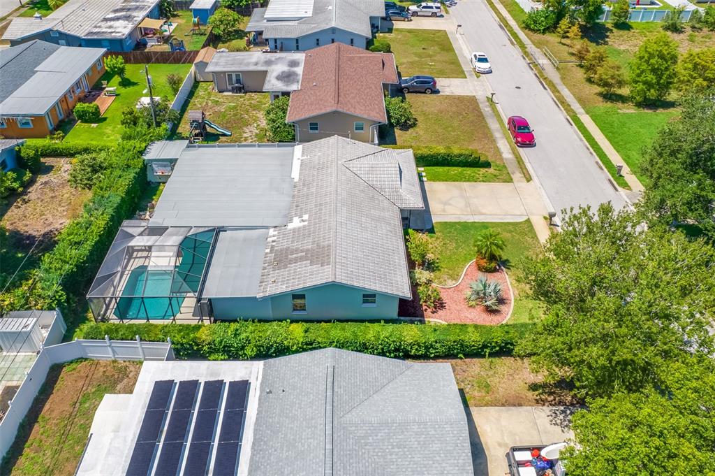 11290 142nd Street North Largo, FL 33774 - Photo 90 of 90 an aerial view of multiple houses with yard
