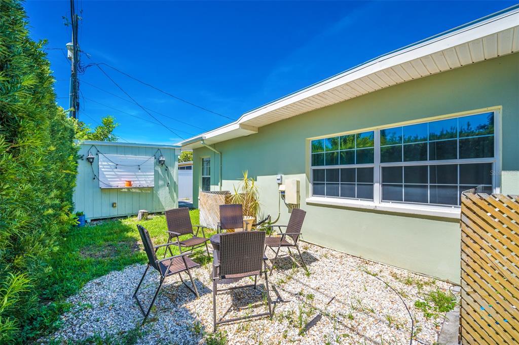 11290 142nd Street North Largo, FL 33774 - Photo 10 of 90 a view of a house with backyard and sitting area