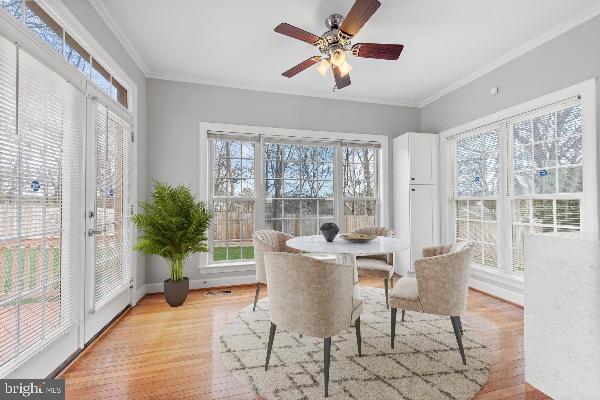 403 Madison Street Herndon, VA 20170 - Photo 15 of 63 a living room with furniture and a large window with wooden floor
