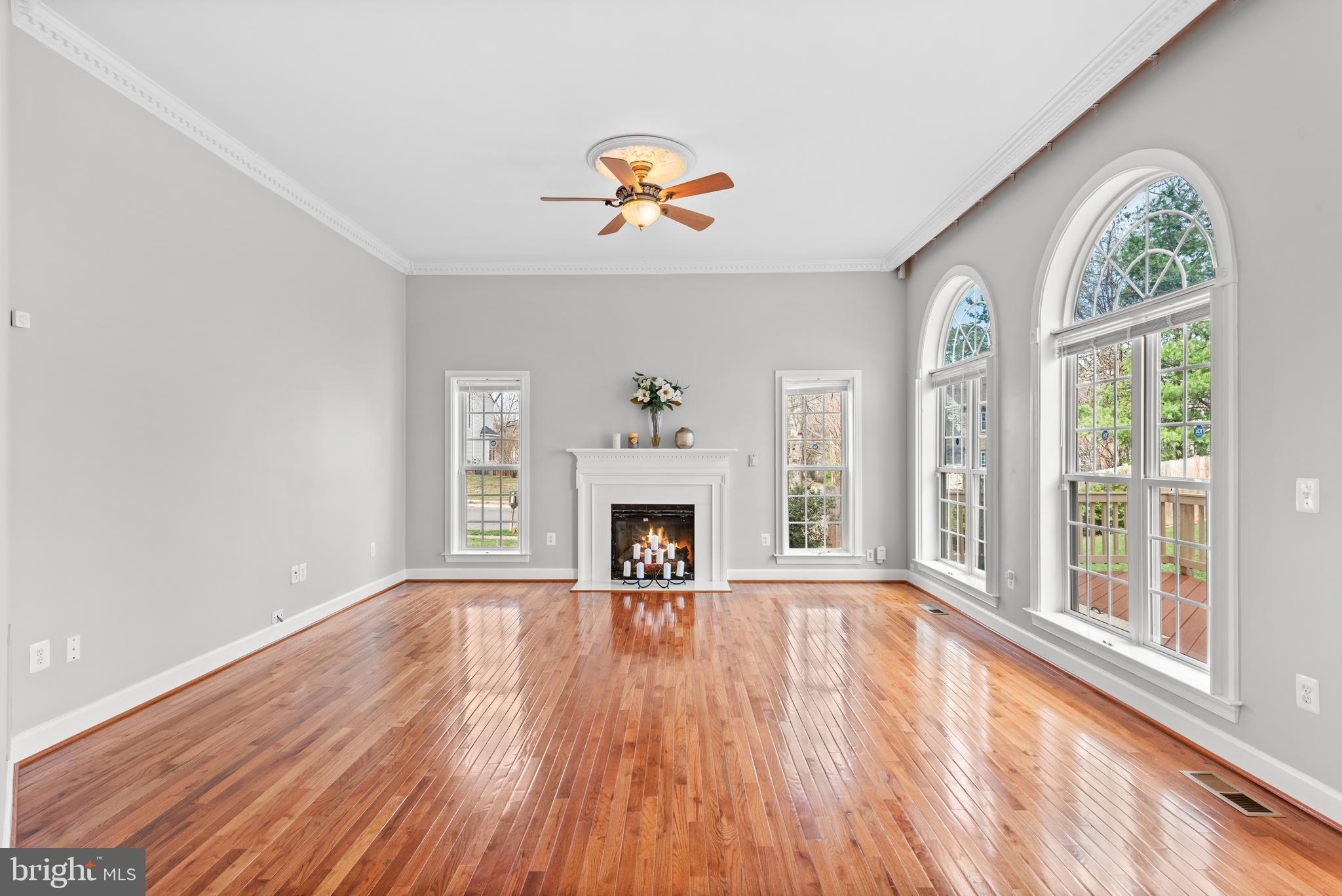403 Madison Street Herndon, VA 20170 - Photo 18 of 63 a view of an empty room with a window and fireplace