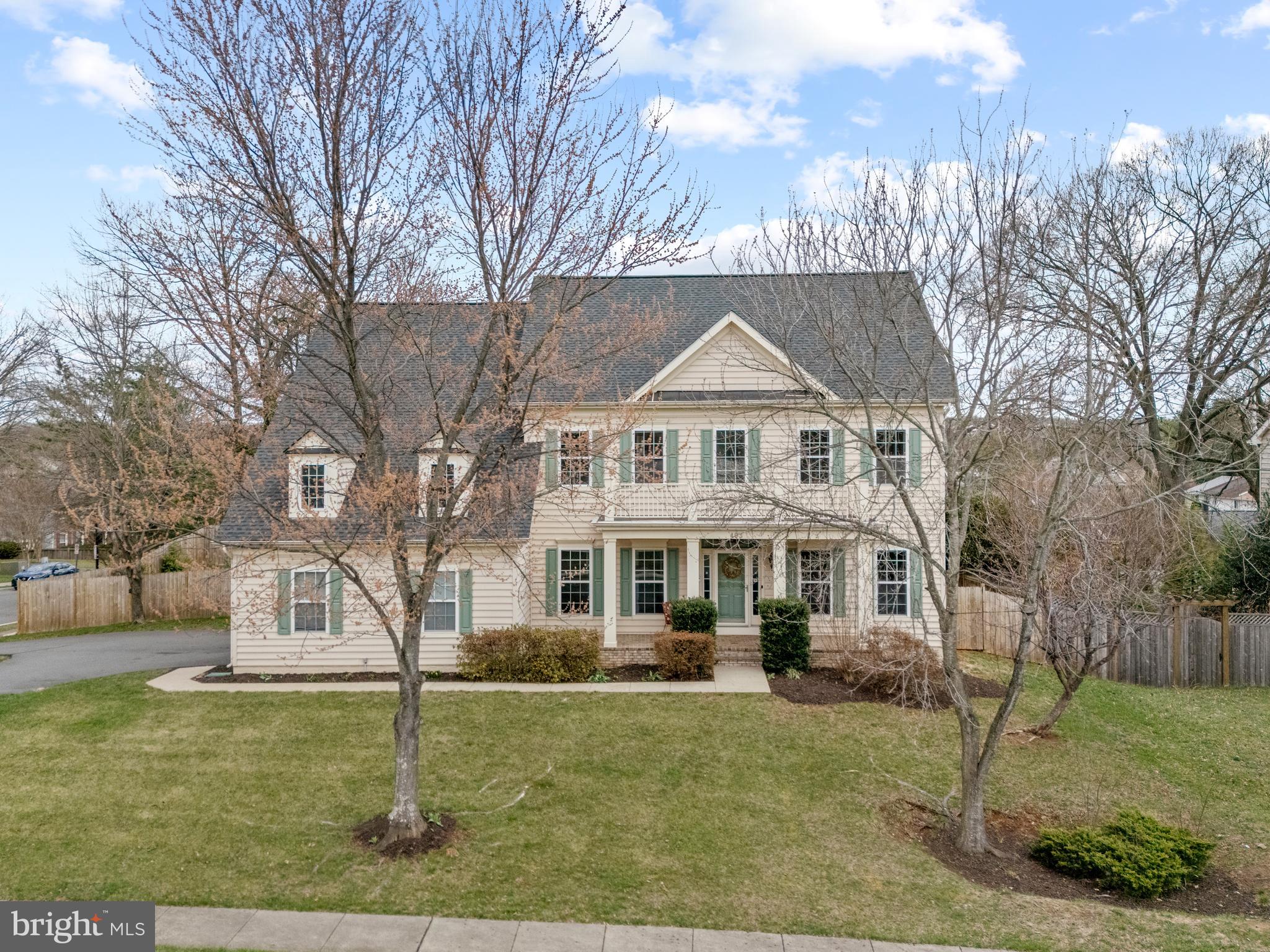 403 Madison Street Herndon, VA 20170 - Photo 2 of 63 a front view of a house with a yard