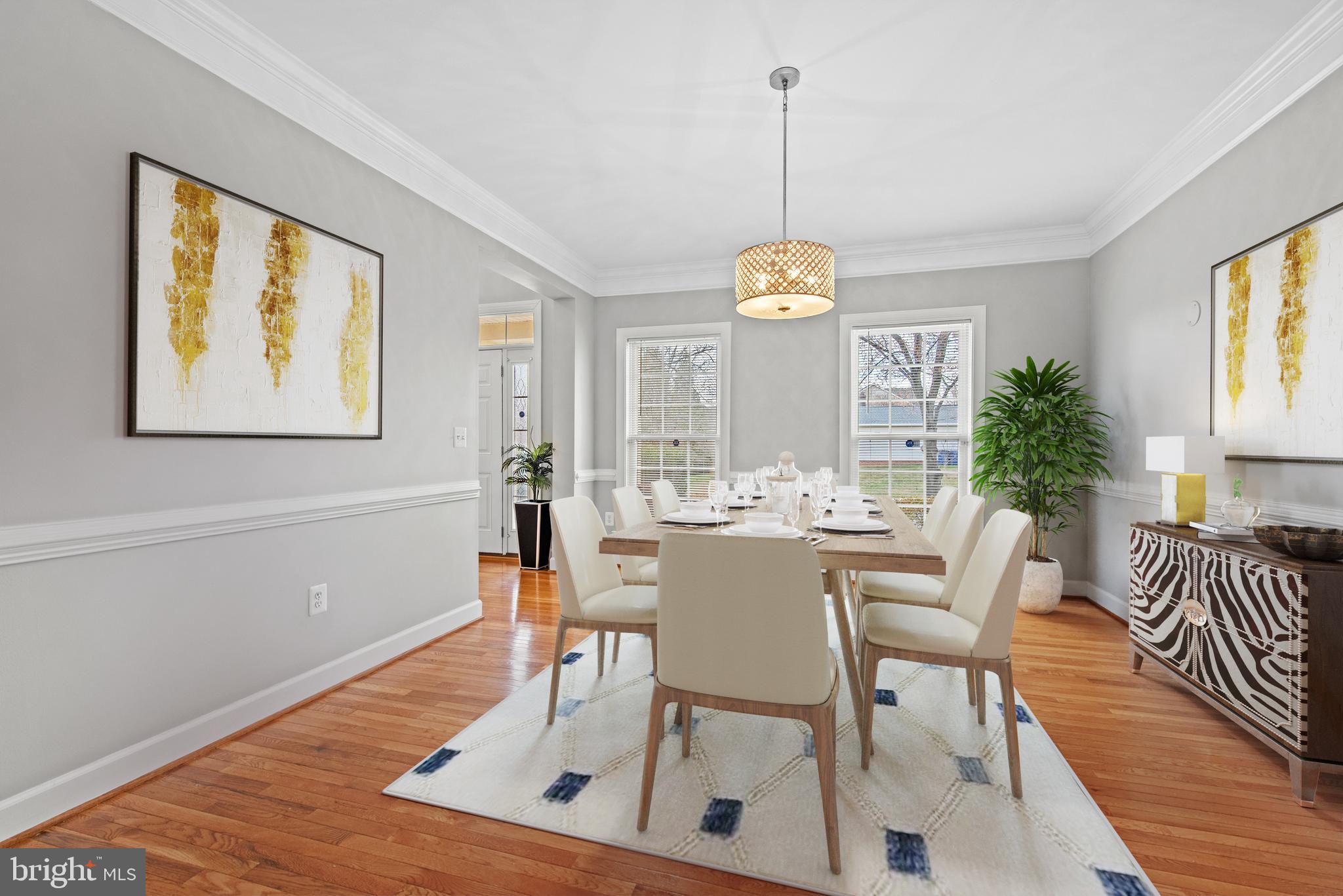 403 Madison Street Herndon, VA 20170 - Photo 21 of 63 a view of a dining room with furniture window and wooden floor
