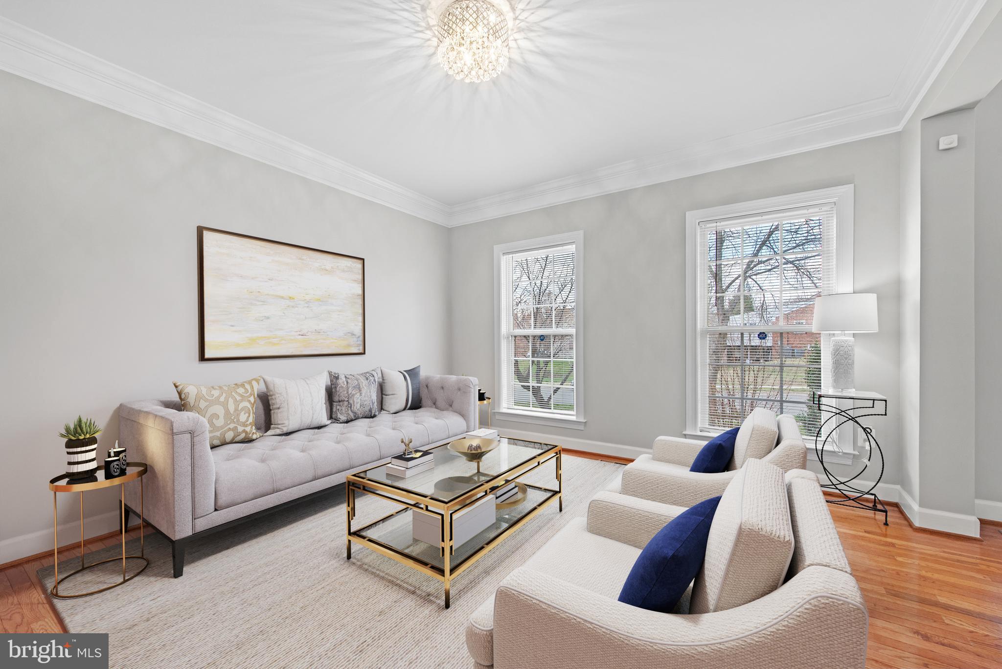 403 Madison Street Herndon, VA 20170 - Photo 24 of 63 a living room with furniture and a large window