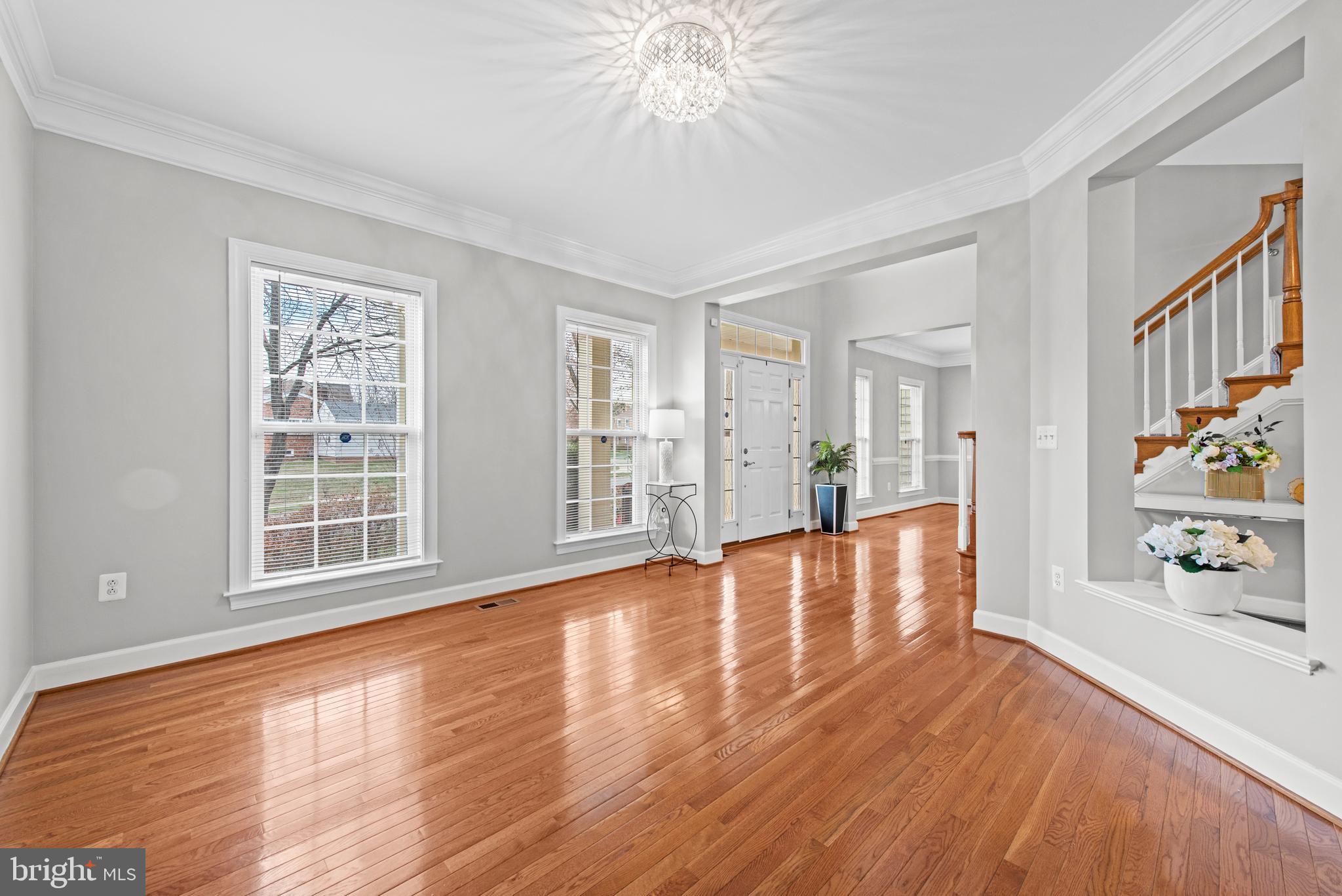 403 Madison Street Herndon, VA 20170 - Photo 26 of 63 a view of an empty room with window and wooden floor