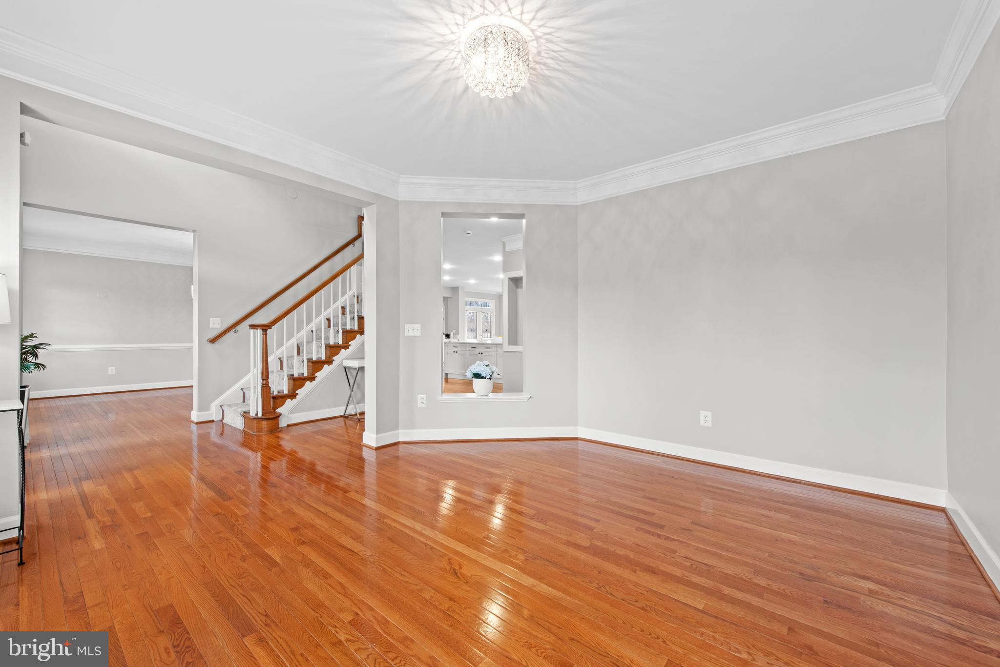 403 Madison Street Herndon, VA 20170 - Photo 27 of 63 wooden floor in an empty room with a window