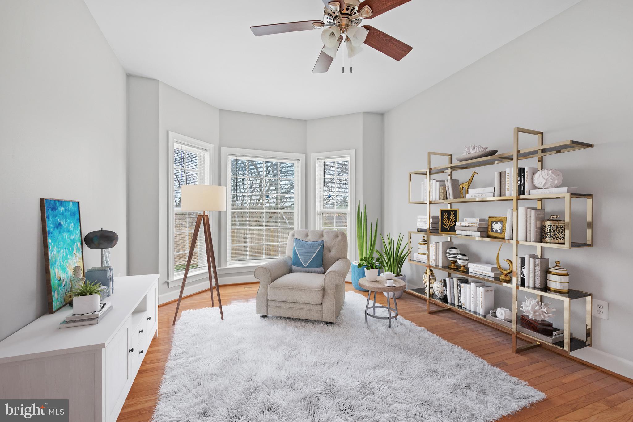 403 Madison Street Herndon, VA 20170 - Photo 28 of 63 a living room with furniture and a large window