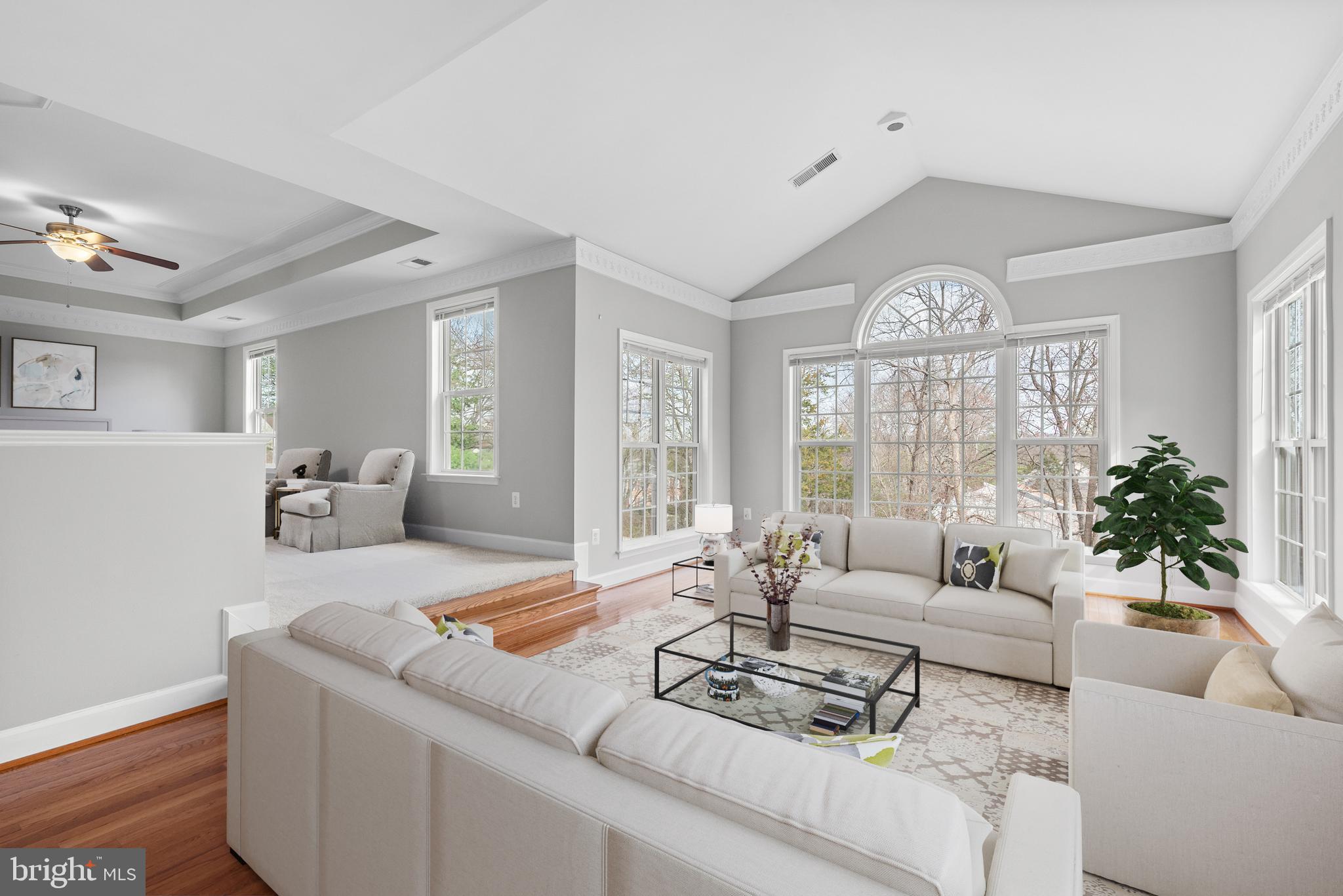 403 Madison Street Herndon, VA 20170 - Photo 33 of 63 a living room with furniture and a large window