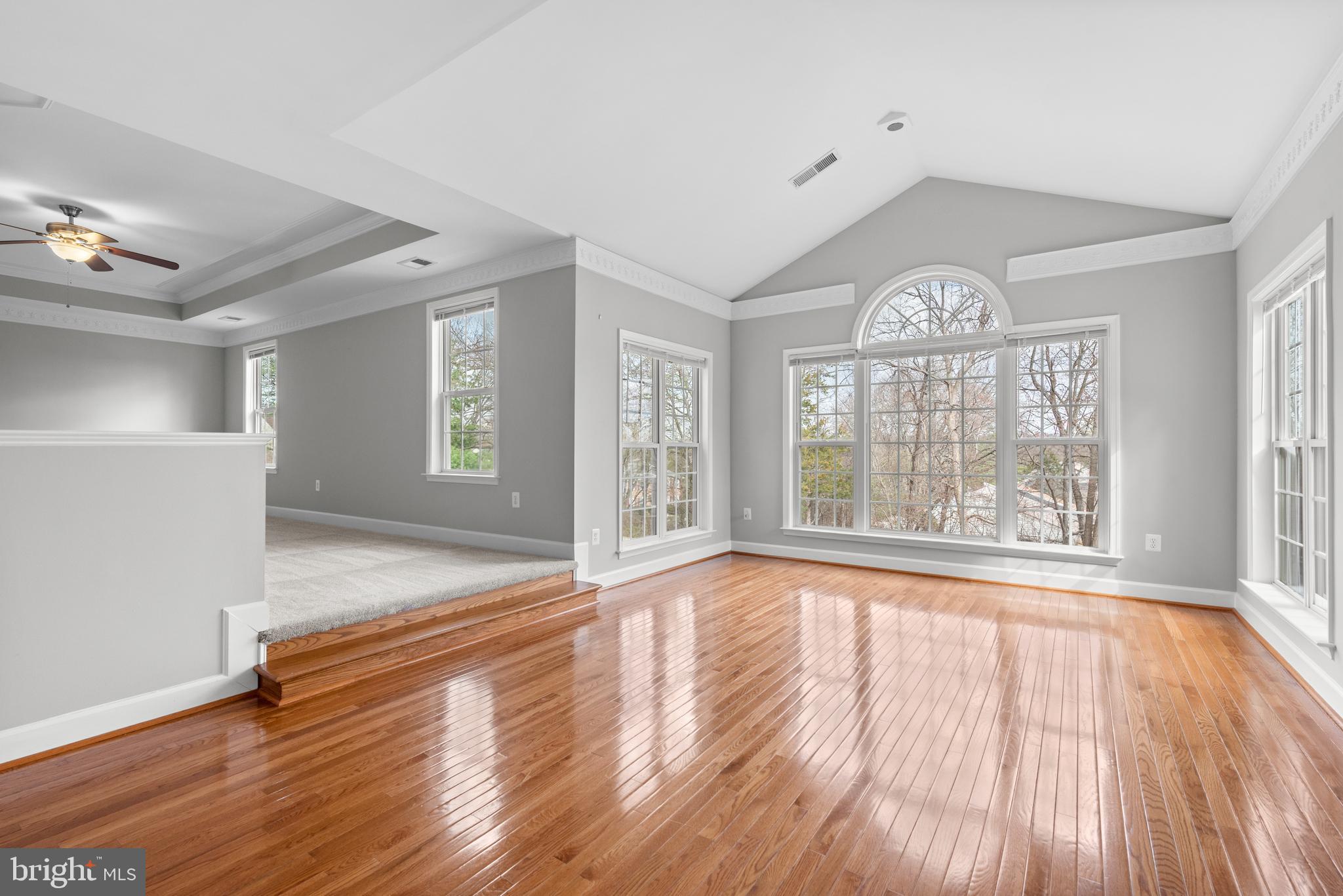403 Madison Street Herndon, VA 20170 - Photo 34 of 63 a view of an empty room with wooden floor and a window