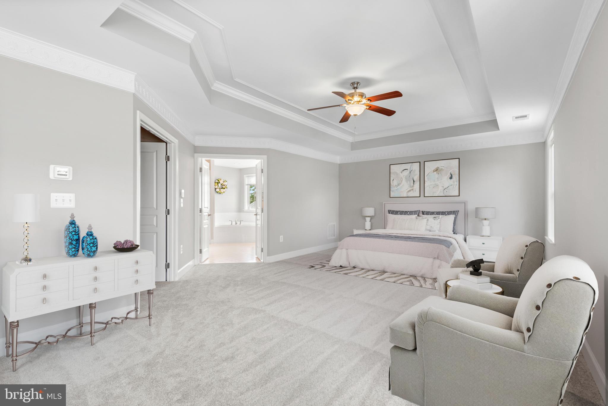 403 Madison Street Herndon, VA 20170 - Photo 35 of 63 a living room with furniture and a chandelier