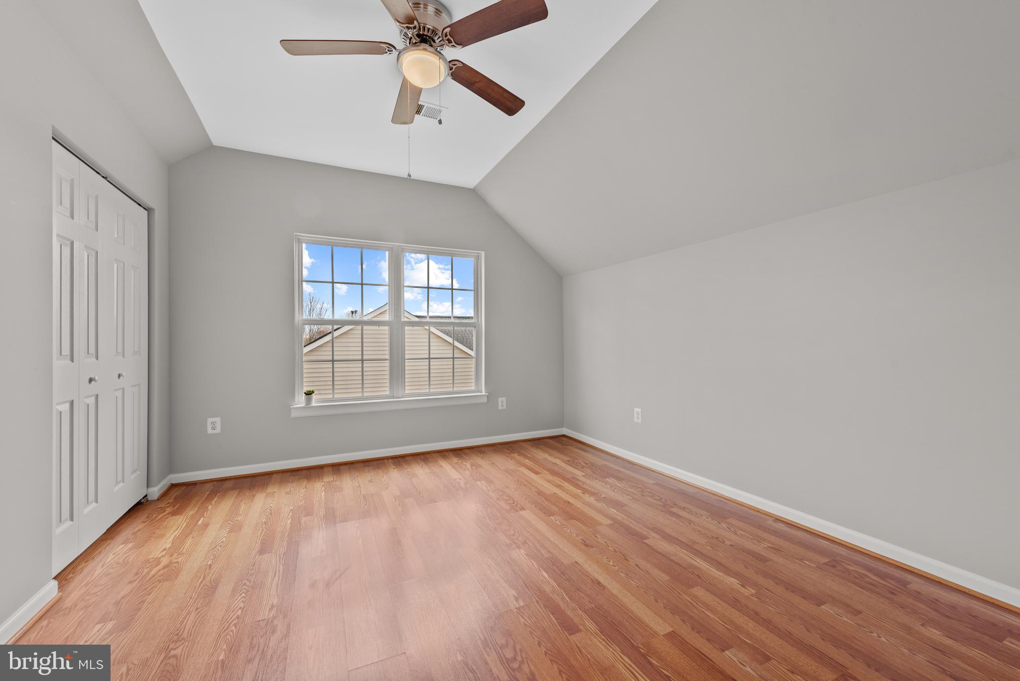 403 Madison Street Herndon, VA 20170 - Photo 50 of 63 wooden floor in an empty room with a window