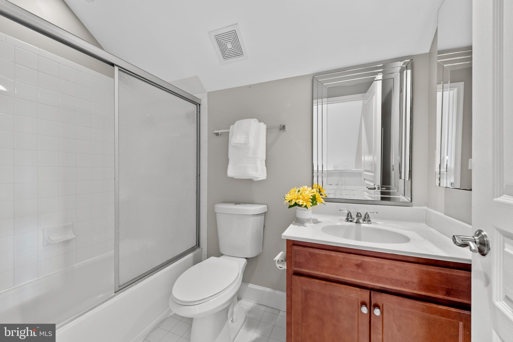 403 Madison Street Herndon, VA 20170 - Photo 51 of 63 a bathroom with a sink toilet and mirror