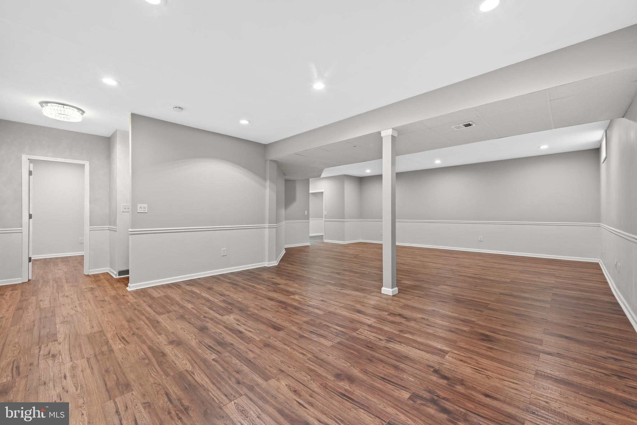 403 Madison Street Herndon, VA 20170 - Photo 52 of 63 a view of empty room with wooden floor