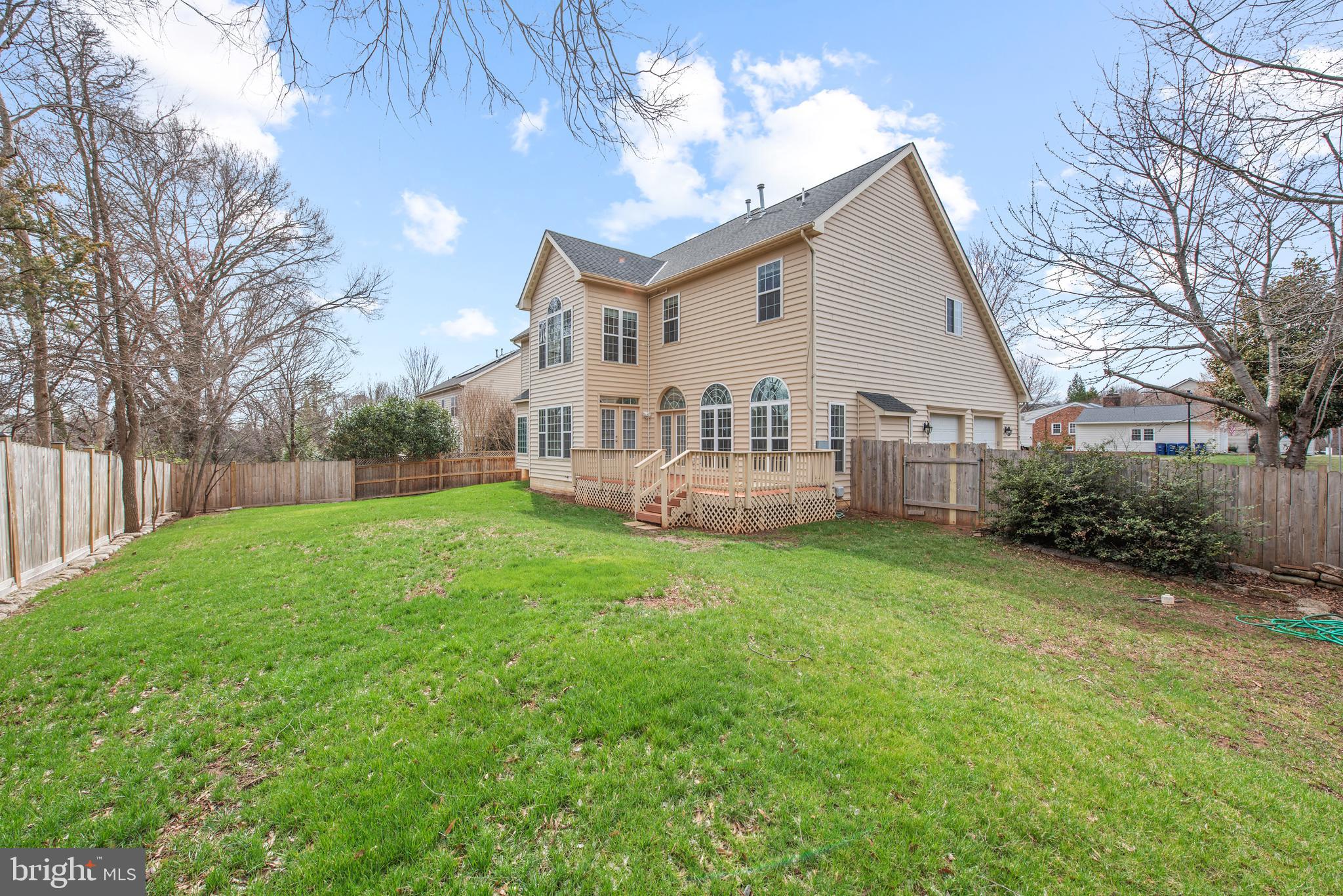 403 Madison Street Herndon, VA 20170 - Photo 60 of 63 a view of a house with backyard and a sitting area