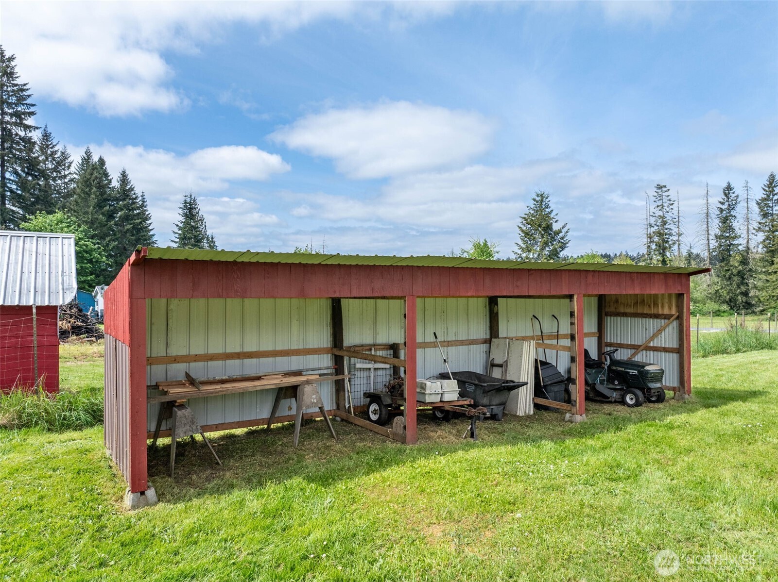 4070 Jackson Highway Chehalis, WA 98532 - Photo 32 of 40 a backyard of a house with table and chairs