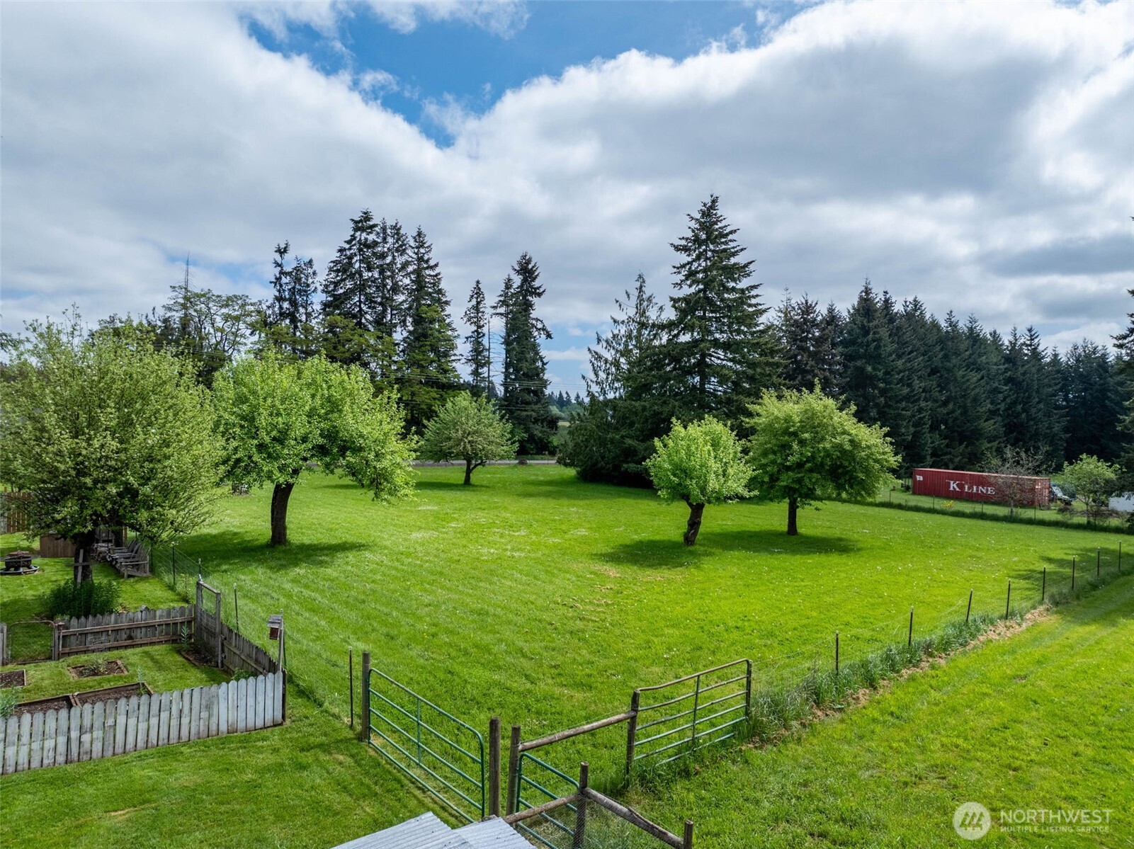 4070 Jackson Highway Chehalis, WA 98532 - Photo 6 of 40 a park with lots of green space pathway and bench