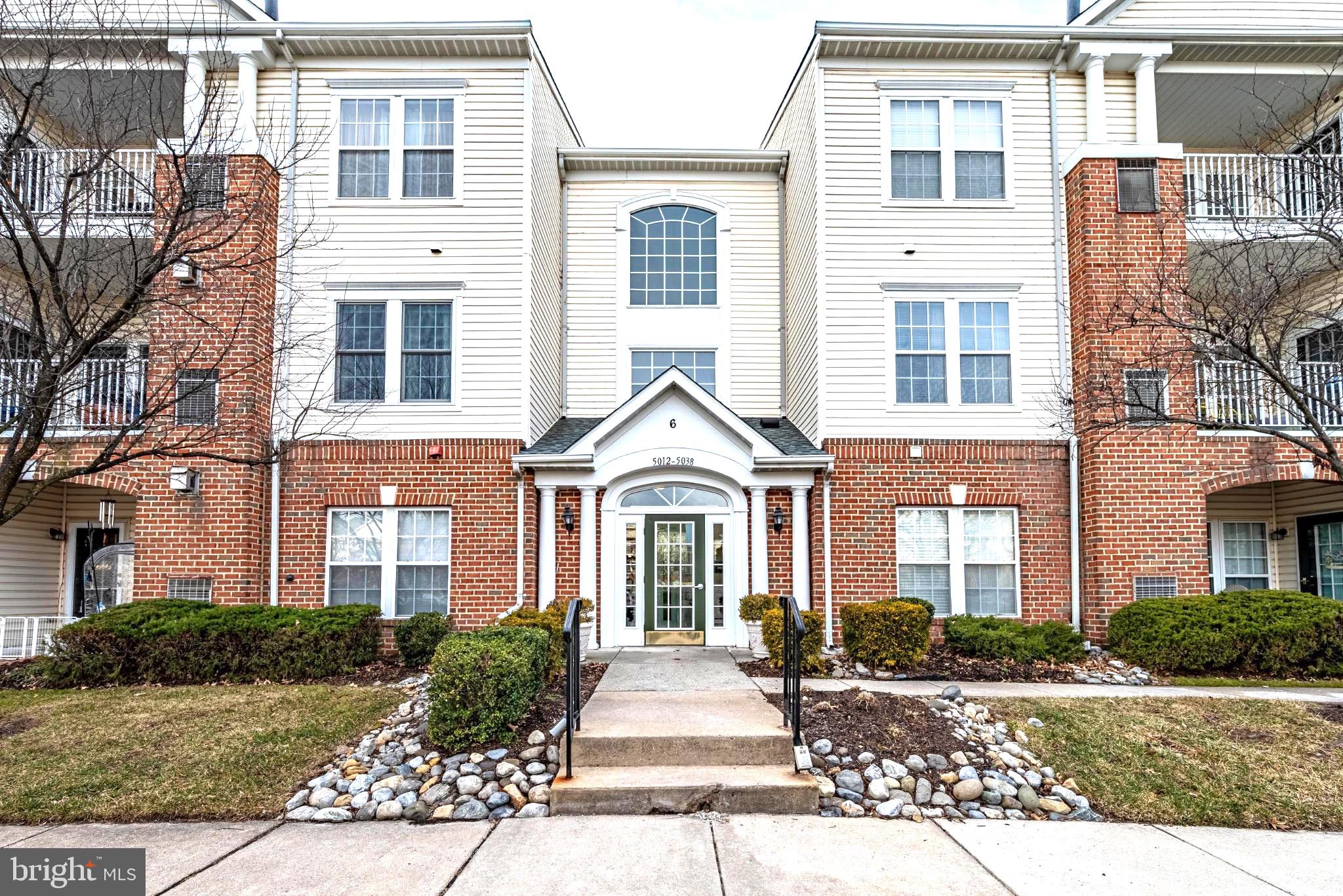 5032 Brightleaf Court, Unit 5032 Rosedale, MD 21237 - Photo 1 of 18 Charming brick-fronted apartment entrance.