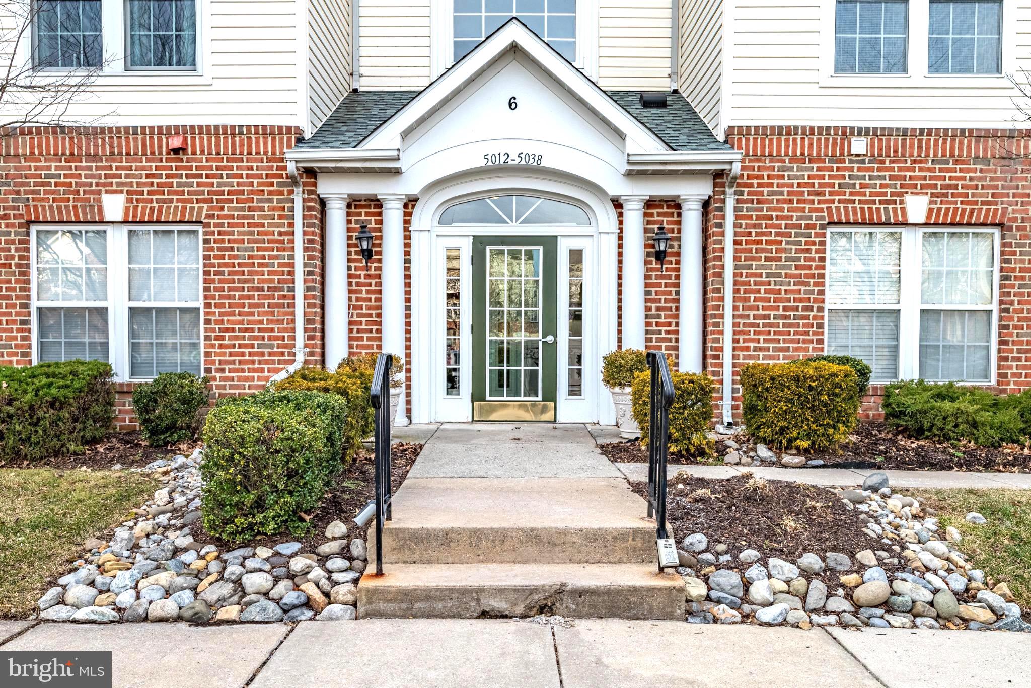 5032 Brightleaf Court, Unit 5032 Rosedale, MD 21237 - Photo 2 of 18 Charming entrance with lush landscaping.