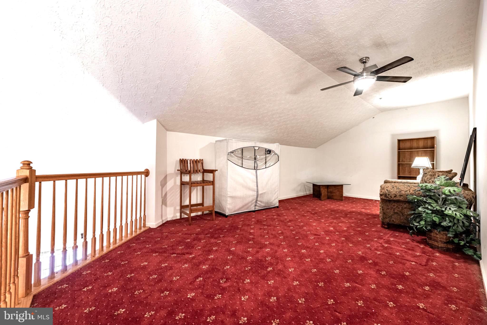 5032 Brightleaf Court, Unit 5032 Rosedale, MD 21237 - Photo 6 of 18 Spacious loft with vaulted ceilings.