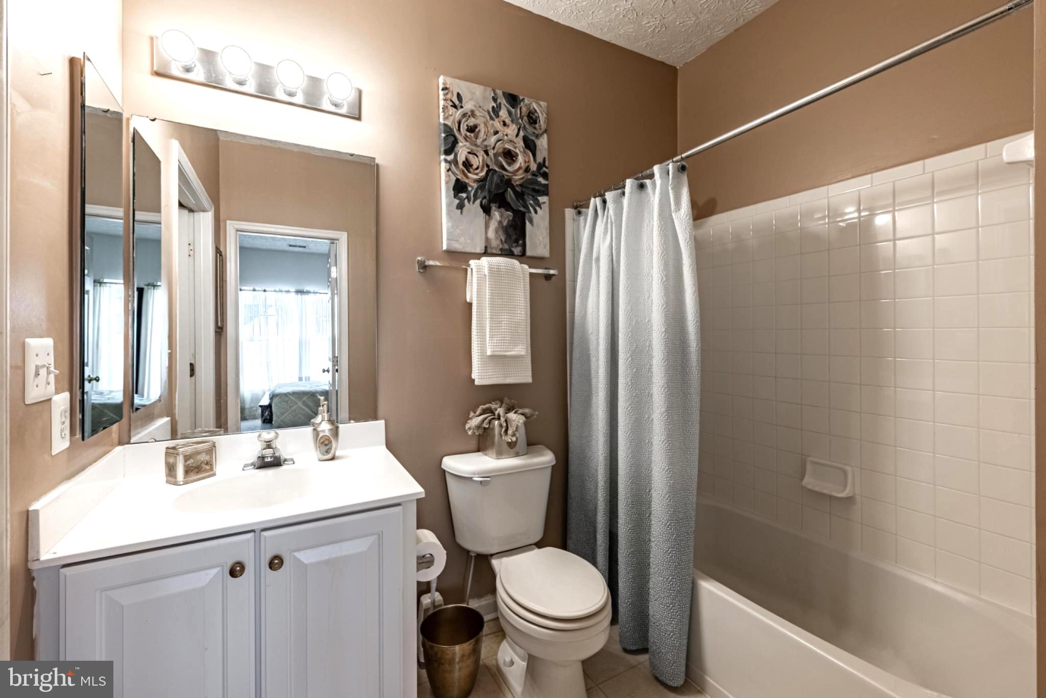 5032 Brightleaf Court, Unit 5032 Rosedale, MD 21237 - Photo 10 of 18 Charming bathroom with modern touches.