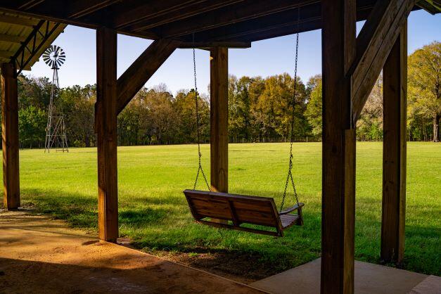 2199 Curtis Madden Road Baker, FL 32531 - Photo 31 of 63 a view of a floor to ceiling window in an outdoor space