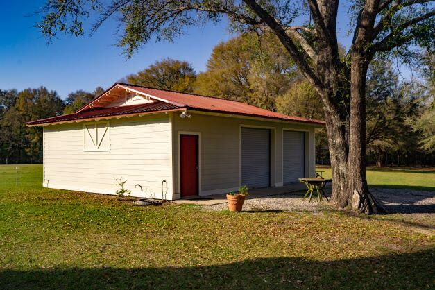 2199 Curtis Madden Road Baker, FL 32531 - Photo 55 of 63 a house view with a garden space