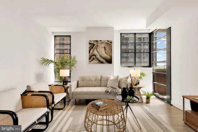 a living room with furniture and a window