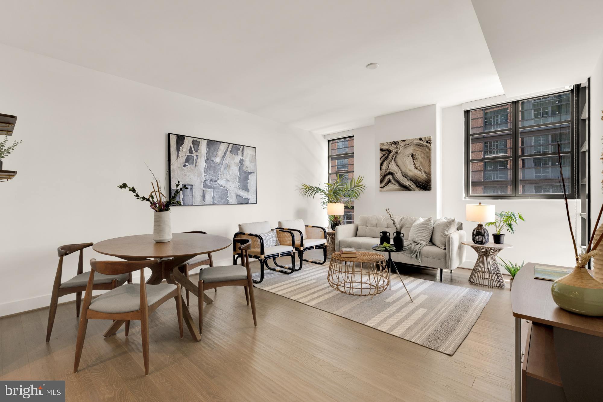 45 Sutton Square Southwest, Unit 303 Washington, DC 20024 - Photo 13 of 45 a living room with furniture a rug and a window