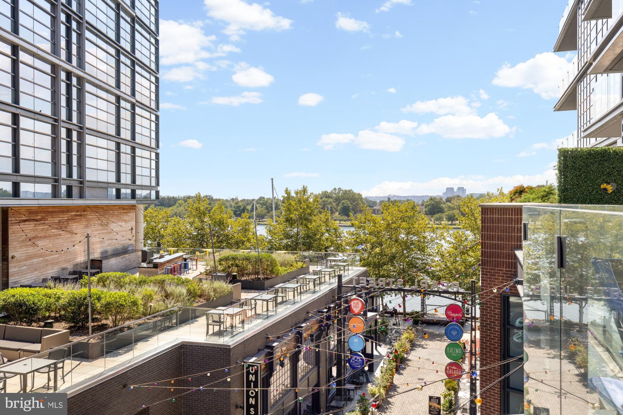 45 Sutton Square Southwest, Unit 303 Washington, DC 20024 - Photo 24 of 45 a view of a city with tall buildings