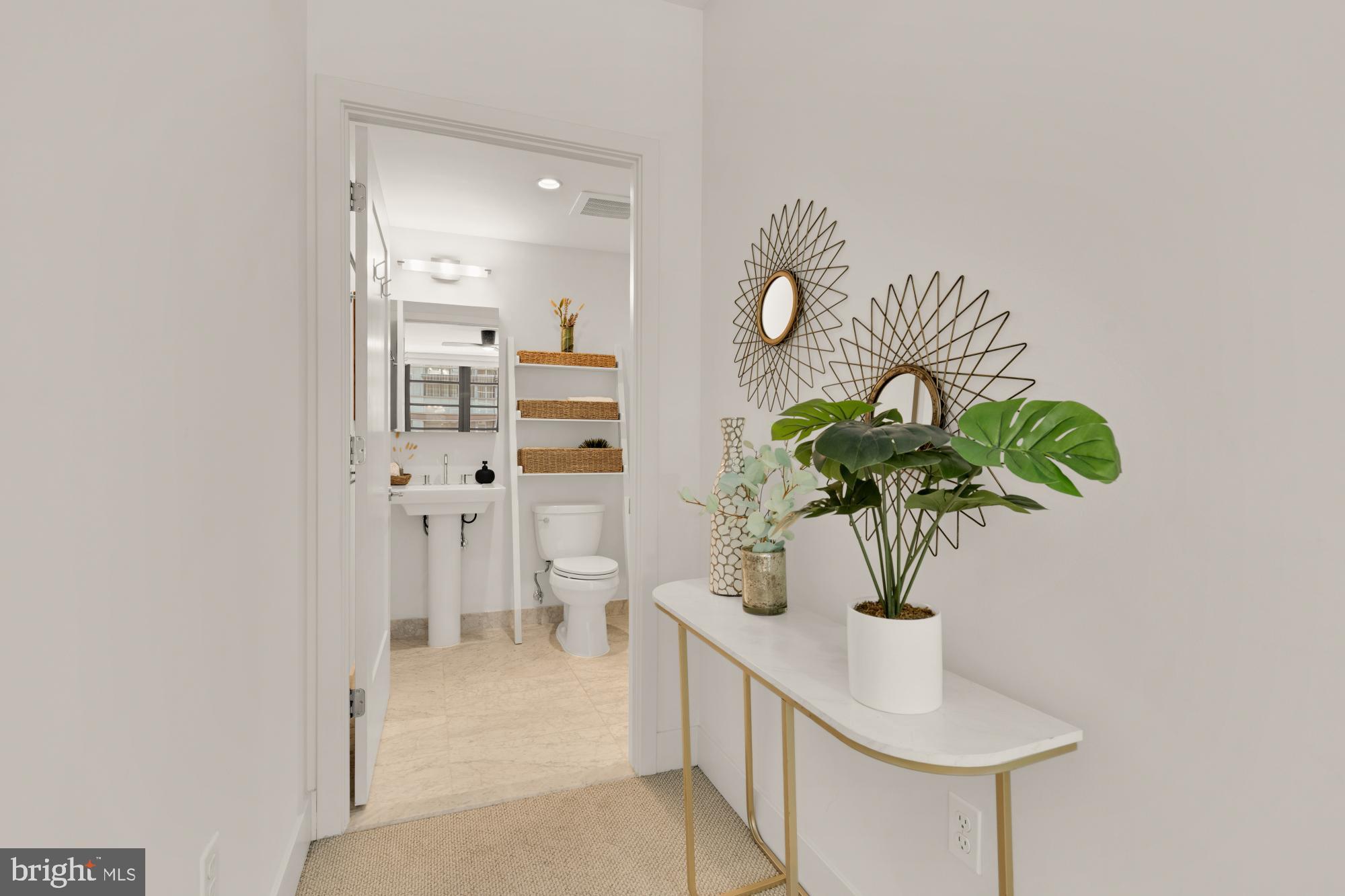 45 Sutton Square Southwest, Unit 303 Washington, DC 20024 - Photo 25 of 45 a glass vase with white flowers