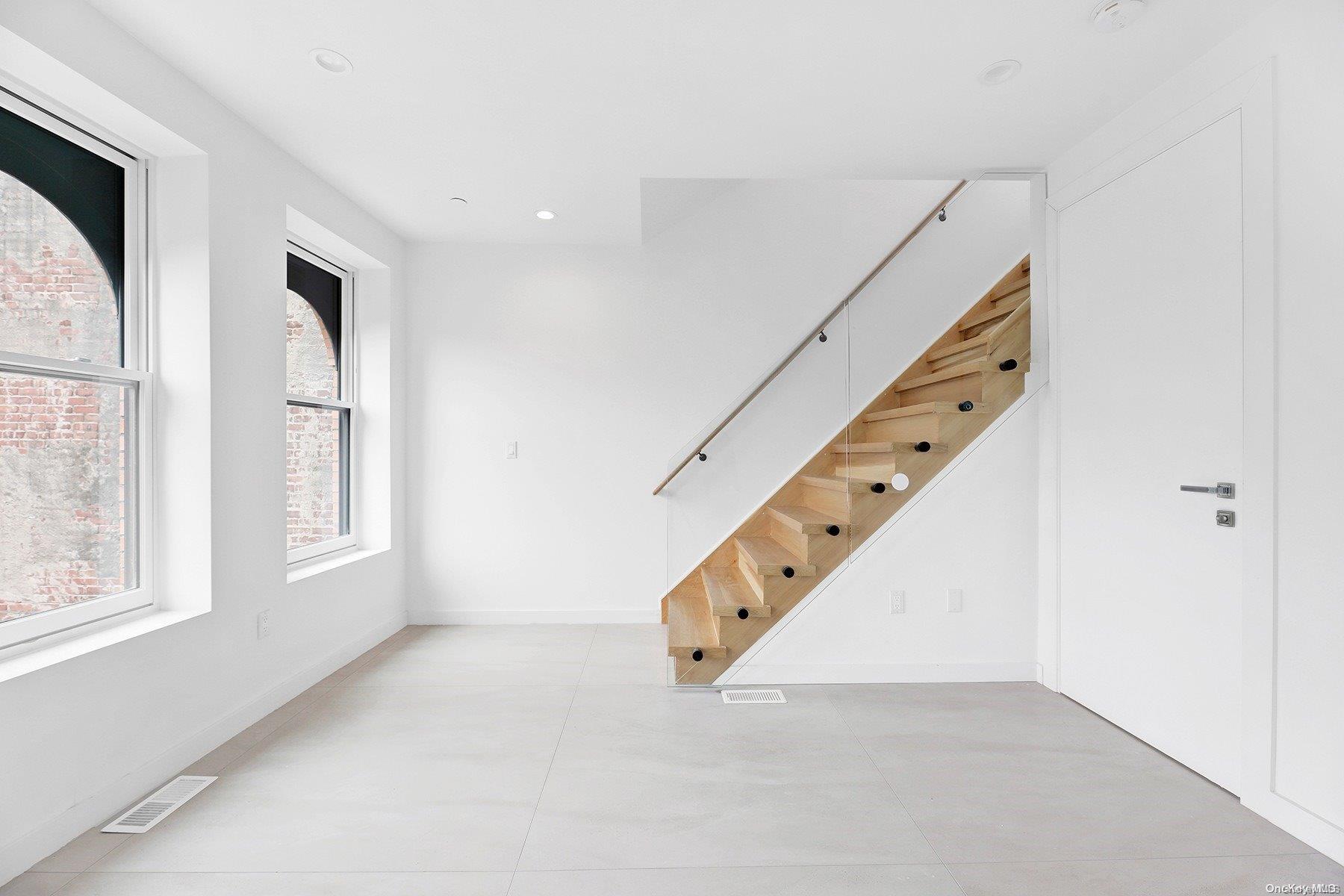 1511 Pacific Street Brooklyn, NY 11213 - Photo 23 of 31 a view of an entryway with staircase