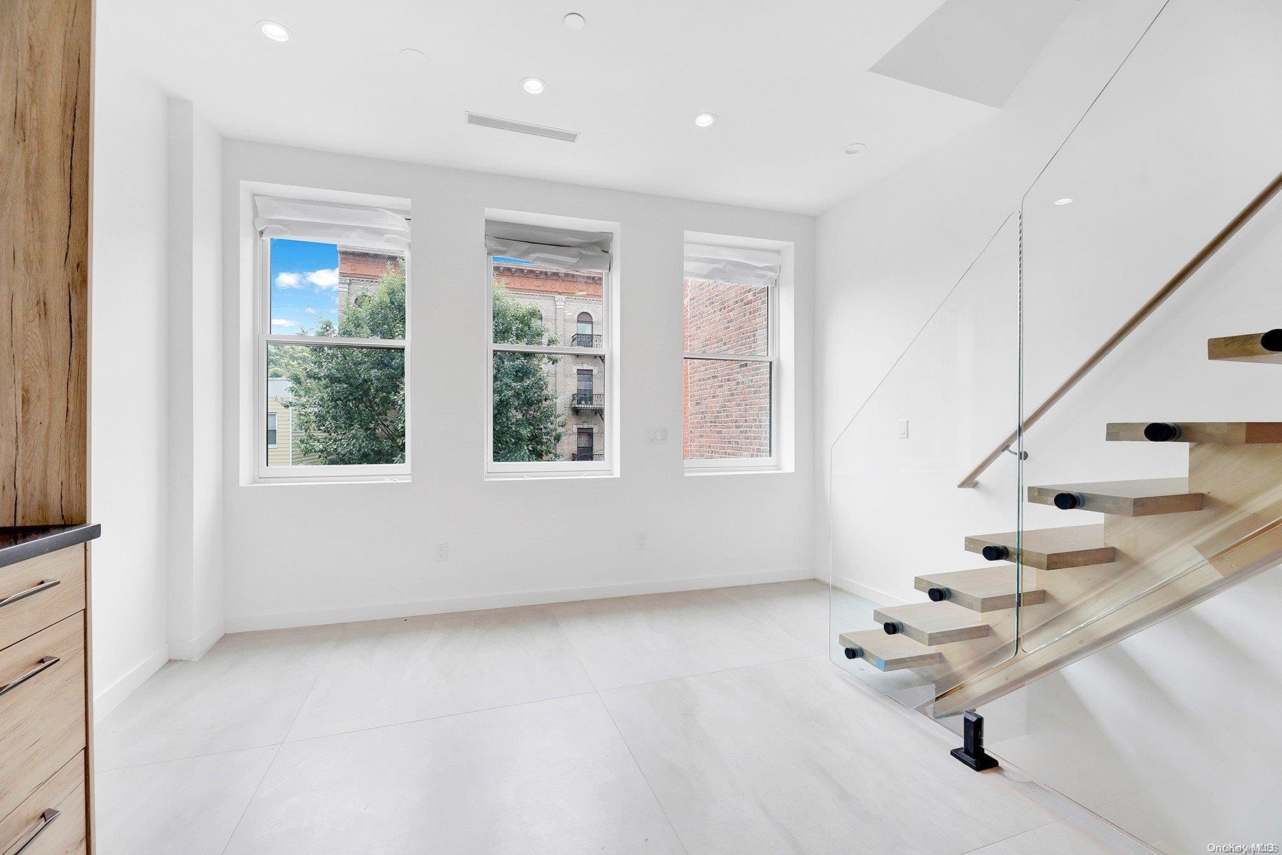 1511 Pacific Street Brooklyn, NY 11213 - Photo 24 of 31 a view of an entryway with stairs